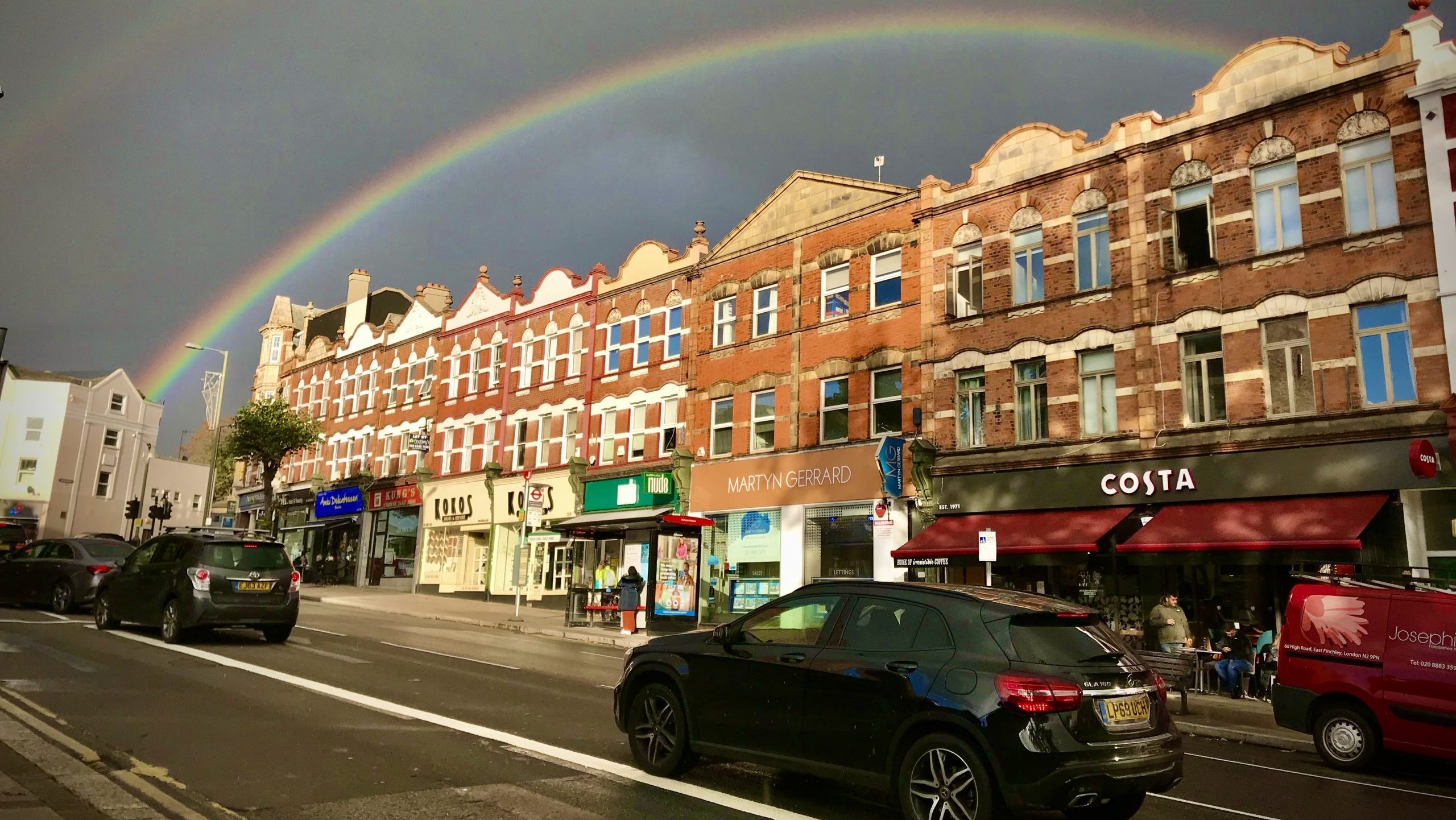 East Finchley High Road with rainbow, N2